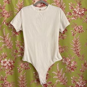 SKIMS:  Cotton Jersey T-shirt Bodysuit